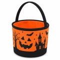 Panier à friandises rond 23 cm en tissu orange et noir à poignée décor citrouille