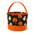 Panier rond 20 cm en polyester noir et orange à poignée pour friandises